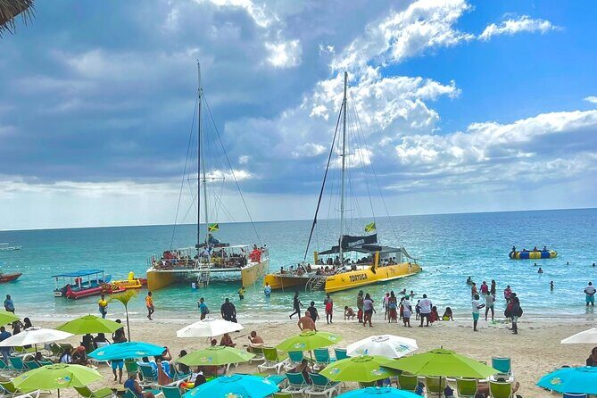 7 Mile Beach Party Catamaran Cruise with Snorkeling & Ricks Cafe - Quick hits you’ll care about