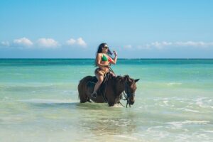 ATV, Bamboo Rafting, Horseback Ride Guided Tour from Montego Bay - Horseback Ride and Ocean Splashes at St. Ann’s Bay