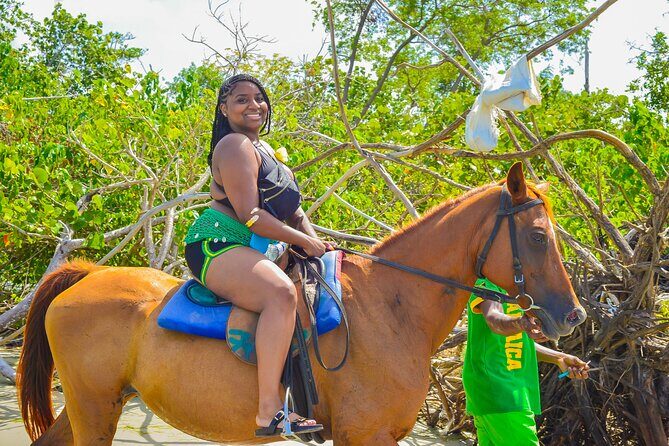 Bamboo Rafting and Horseback Riding Tour Montego Bay Jamaica - Bamboo Rafting on a River: 1 Hour 45 Minutes of Slow Fun