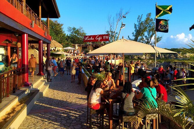 Bamboo Rafting, ATV and Ricks Café in Jamaica Tour - Rick’s Café in Negril: sunset views, live music, and cliff jumping