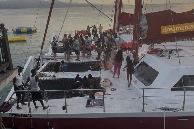 Bamboo Rafting, Catamaran Party Cruise and Snorkeling in Jamaica - Rick’s Café Sunset Stop: a classic way to slow the pace