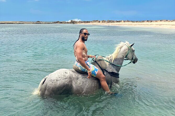 Bamboo Rafting & Horseback Ride n Swim Guided Tour In Montego Bay - Braco Stables horseback ride: private beach start, countryside ride next