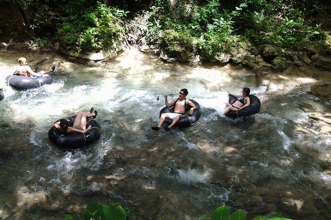 Blue Hole and River Tubing from Montego Bay - White River Tubing: Float, Splash, and Rope-Swing Moments