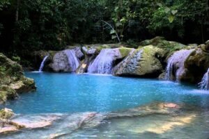 Blue Hole Secret Falls and River Tubing Private Tour - Cool Blue Hole and Secret Falls: Swings, Jumps, and a Mountain Water Moment
