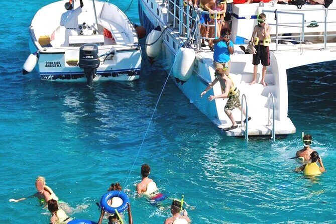 Catamaran Party Cruise and Snorkeling from Montego Bay - Margaritaville After Dark: Water Slide Fun and the Real Cost of Snacks