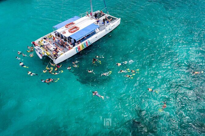 Catamaran Party Cruise and Snorkeling from Montego Bay - What You Get Onboard: Open Bar, Snacks, and DJ Energy