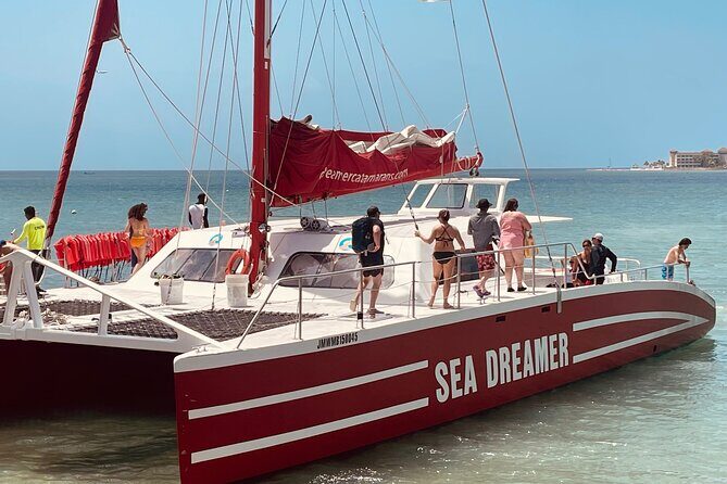 Catamaran Party Cruise and Snorkeling in Montego Bay - Food planning: snacks and water are included, dinner is not