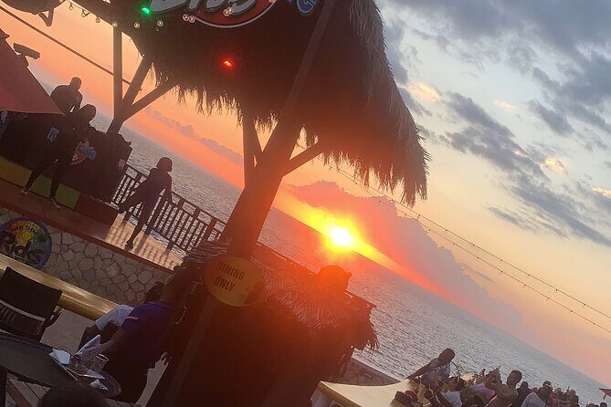 Combo tour ATV + bamboo river rafting from Montego Bay - Stop 3 at Rick’s Cafe: Cliff Views, Entertainment, and the Ocean Jump Option