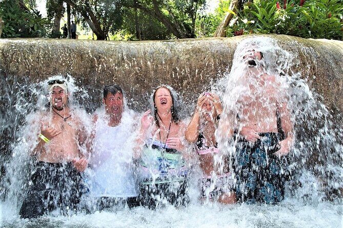 Dunn's River Falls & Luminous Lagoon Guided Tour from Montego Bay - Luminous Lagoon: glowing water, boat ride, and the swim question