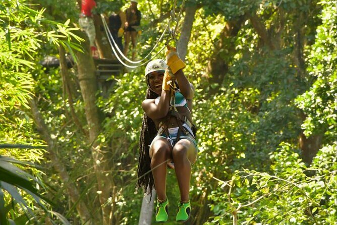 Dunns River Falls, Rafting, Zipline & Horseback from Montego Bay - White River rafting on a 30ft bamboo raft