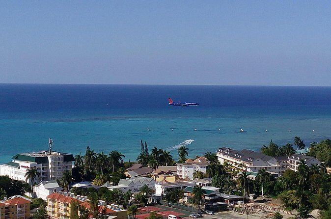 EXCLUSIVE AIRPORT / CRUISE PORT TRANSFER 1-4 Pax - The Stops Along the Way: Bolt, Hip Strip, Margaritaville, and More