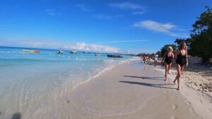 From Montego Bay: Negril Beach & Rick's Cafe Sunset Day Trip - Margaritaville on the Sand: Beach Comfort Without the Big-City Stress