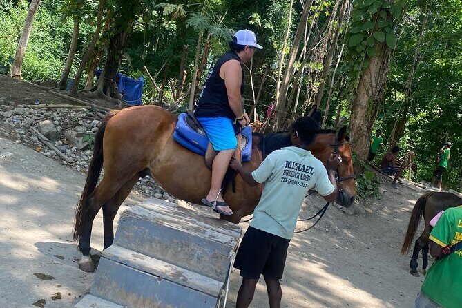 Full Day Rafting, Horse Back Riding and Blue Hole in Jamaica - Horseback riding near Ochi Rios: forest paths and the Caribbean edge