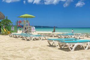 Full Day Tour of Negril Beach: Margaritaville & Rick's Cafe Live - Margaritaville Negril: Jimmy Buffet style, food, and optional water sports