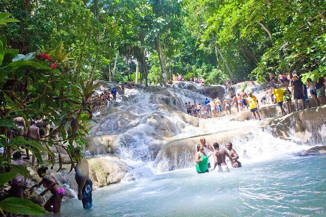 Green Grotto Caves and Dunn's River Falls Guided Tour with Admission - Two Jamaica icons, one guided day
