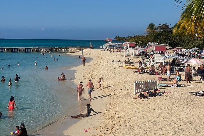 Jamaica Adventure: Bamboo Rafting, Negril Beach & Rick's Sunset - Rick’s Cafe Sunset: Jamaican Food, Drinks, and Cliffside Spectacle