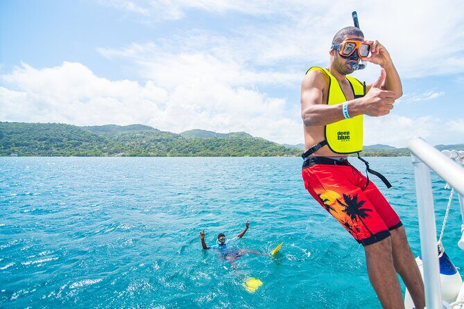 Jamaica All-Access Adventure Pass at Ocean Outpost - Catamaran day: rum punch, DJ vibes, and snorkel only if conditions allow