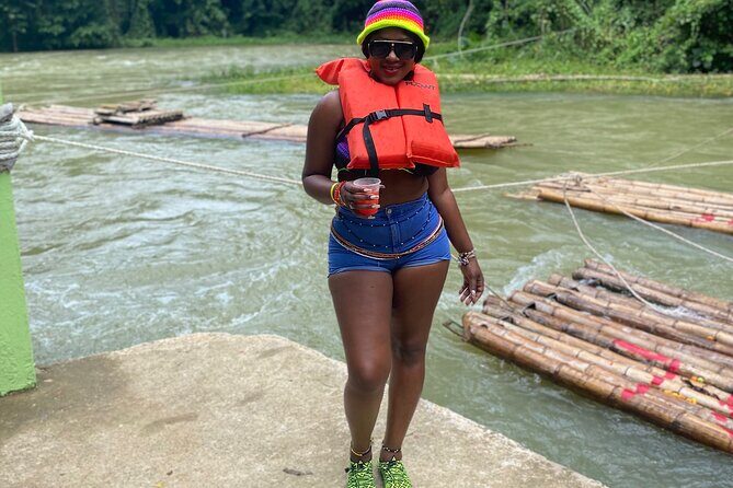 Martha Brae Bamboo Rafting Experience From Montego Bay - Refreshments on board: coconuts and Red Stripe as part of the vibe