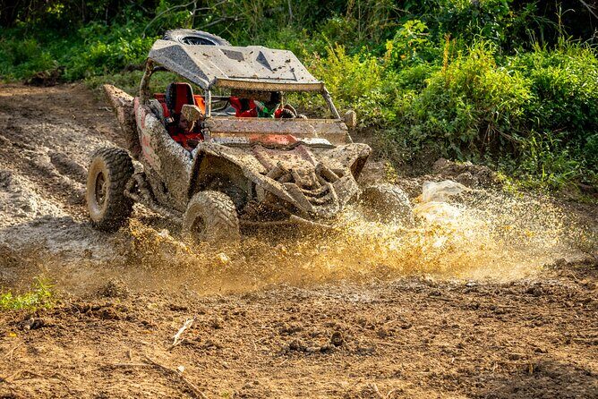 Missile Adventure Park Negril Jamaica ATV Tour Adventure - Safety and comfort: helmets, harnesses, and the air-conditioned ride