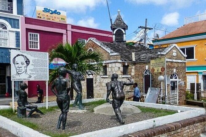 Montego Bay Highlights Tour with Shopping and Bamboo Rafting - Jimmy Cliff Boulevard and the Hip Strip: duty-free shopping with a famous backdrop