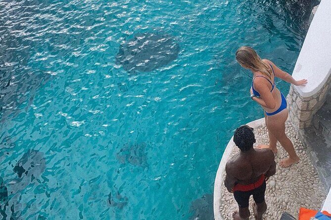 Negril 7 mile Beach, Party Catamaran Cruise , Snorkeling and Ricks Cafe Combo - Seven Mile Beach: two hours of sand, swimming, and optional extras