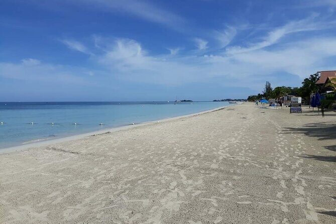 Negril 7 Miles Beach and Rick's Cafe Tour - Seven Mile Beach: how to use your time on the sand well