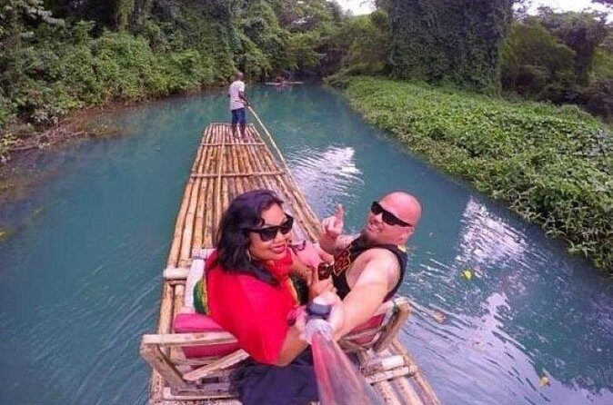Private Round-trip Shuttle to Martha Brae from Montego Bay - The onboard extras: water and a drink before you reach the river