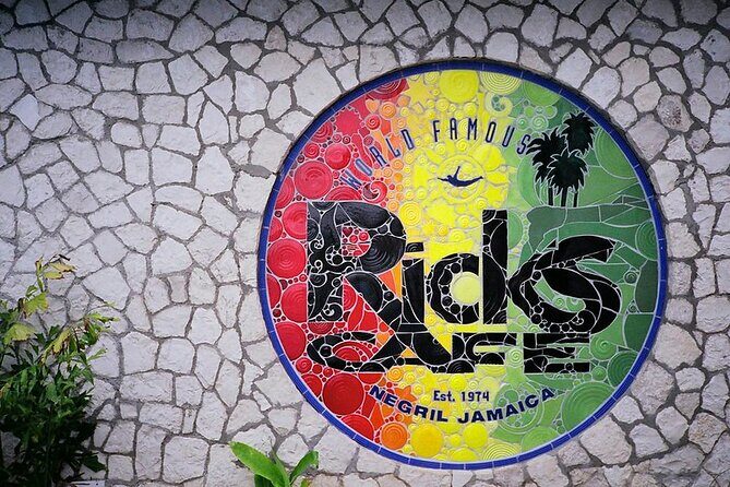 Private Tour of Negril Beach and Sunset at Ricks Cafe - Stop 3: Rick’s Cafe for sunset, music, and cliff-jumping views