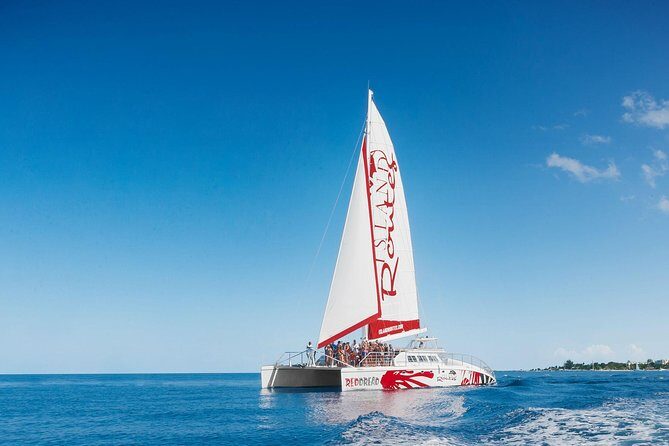 Reggae Catamaran and Snorkeling Open Bar Cruise Montego Bay - Snorkeling Near Doctor’s Cave Beach: Calm Water, Short Time, Real Gear