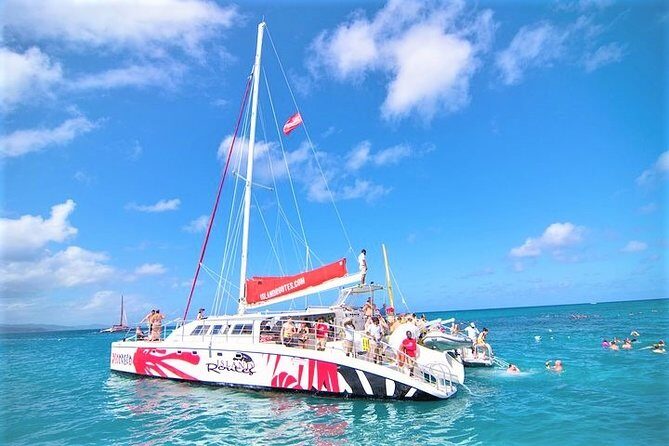 Reggae Catamaran and Snorkeling Open Bar Cruise Montego Bay - Back on Board: Unlimited Drinks, Jamaican-Style Appetizers, and the Dance Rhythm
