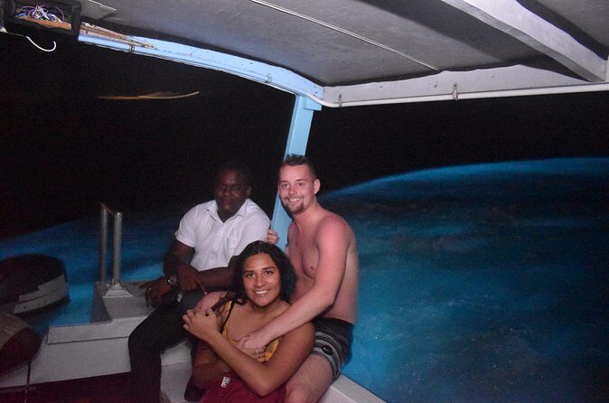 Rose Hall Great House & Luminous Lagoon -Customize Night Tour from Montego Bay - Luminous Lagoon on a boat: seeing tiny light move in the dark